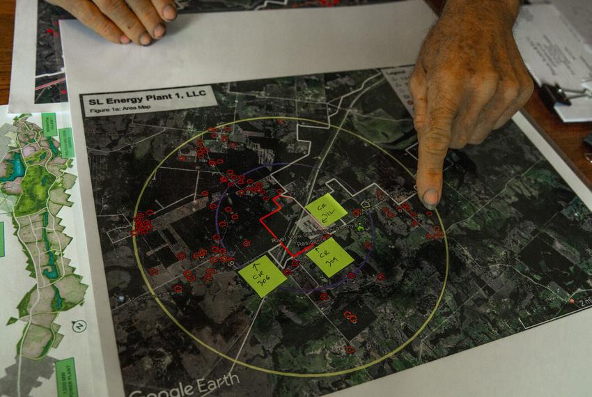Hugh Brown points to his home on a map of the 1,200 MW gas plant proposed by Sandow Lakes Energy Co., pictured on May 7, 2025.